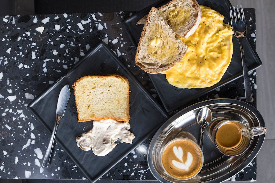Breakfast spread with coffee and toast
