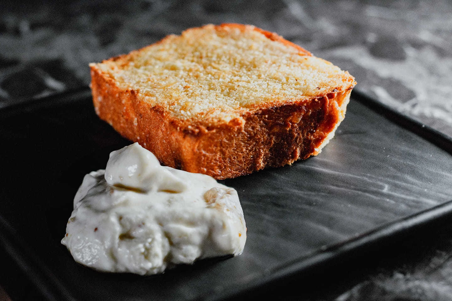 Thick slice of golden butter pound cake