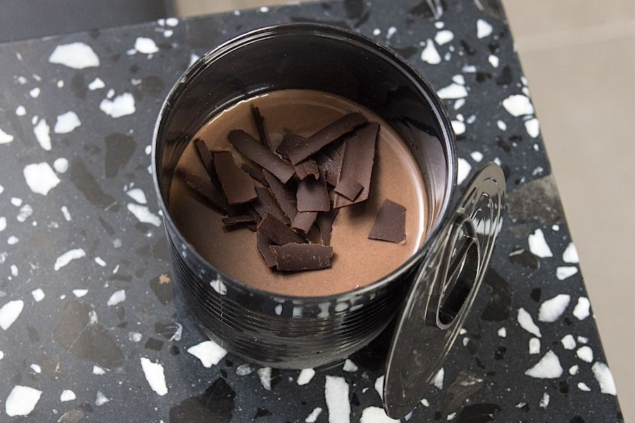 Iced chocolate served in vintage metal tin
